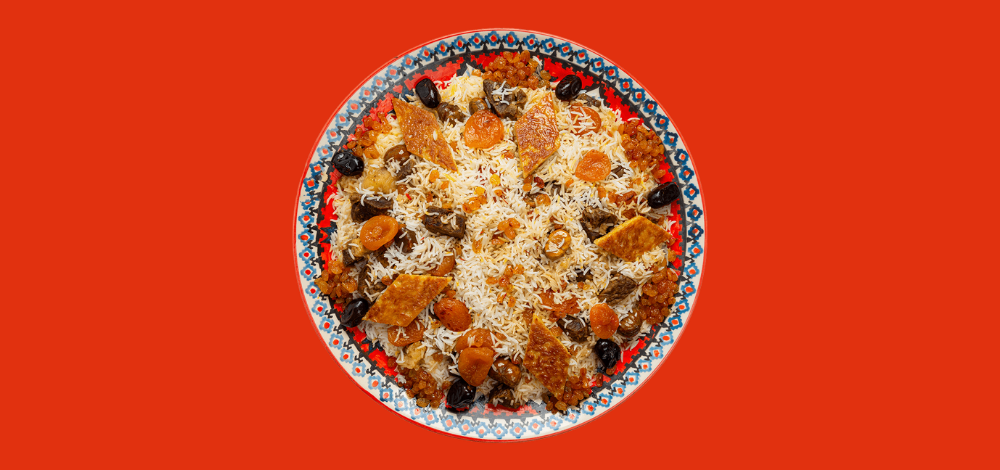 Shirin plov in Baku with dried apricots, raisins and saffron rice